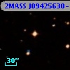 2MASS J09425630-1617326
