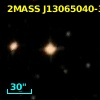 2MASS J13065040-3632410