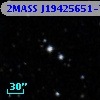 2MASS J19425651-7144052