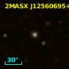 2MASX J12560695+6108185