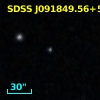 2MASS J09184954+5456018