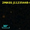 2MASS J11235448-0319404