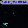 2MASS J23185676-0031322