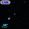 CAIRNS J015735.72+000517.6