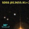 2MASS J01365590+2425460