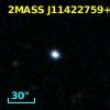 2MASS J11422759+7008595