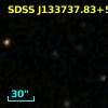 [VV2006c] J133737.9+555816