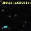 2MASS J13350511+5643547