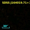[VV2006c] J164019.7+385637
