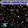 2MASS J18432354+0520344
