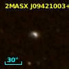 2MASX J09421003+5217274