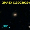 2MASX J13003929+5436567