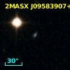 2MASX J09583907+4946243
