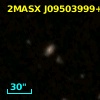 2MASX J09503999+4640456