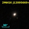 2MASX J12095669+4705461