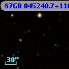 87GB 045240.7+110016