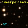 2MASS J05122947+1639404