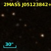 2MASS J05123842+1613199