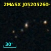 2MASX J05205260-1307387