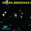 2MASX J00592442+5234485