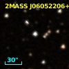 2MASS J06052206+2325044