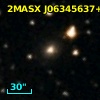2MASX J06345637+2440474