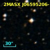 2MASX J06595206-1116041