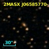2MASX J06585770-1437158